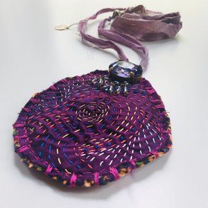 Handmade one of a kind up-cycled fabric necklace.